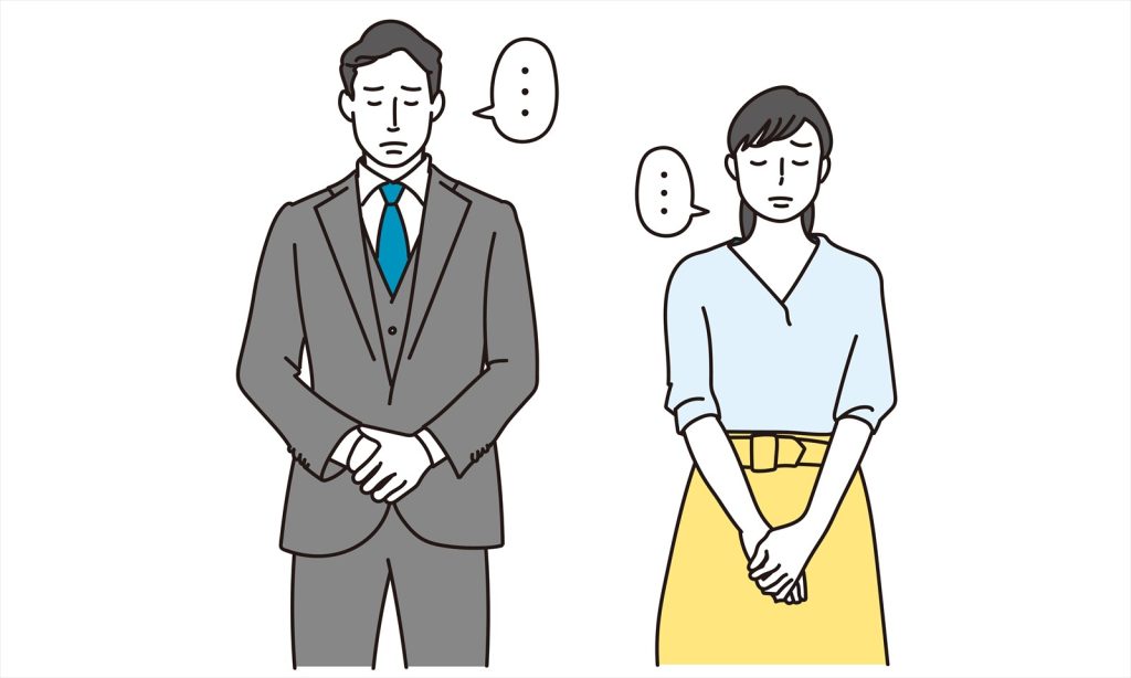 1on1が形骸化した組織で起きる問題を想起させる画像(沈黙する男女)